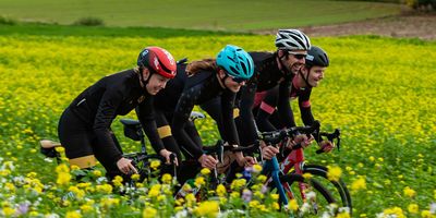 custom cycling jersey team wearing blue TD Sportswear kit group photo