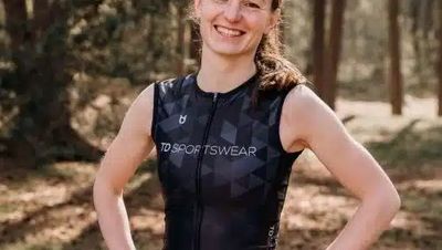 Women's sportswear, evolution TD Sportswear model posing in a trisuit.