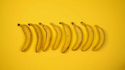 The very best cycling snacks displayed as 8 bananas on a yellow background